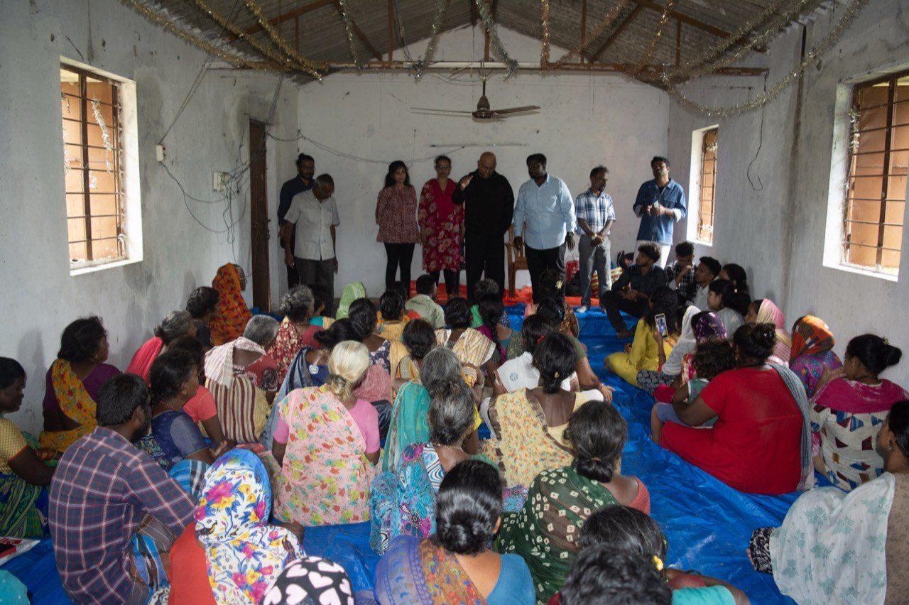 Families gathered at a Face of Hope community event in Asia