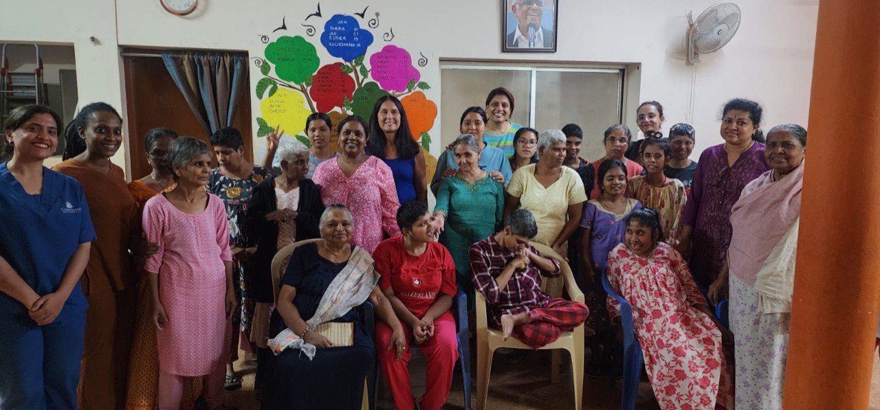 Women and children from a community served by Face of Hope